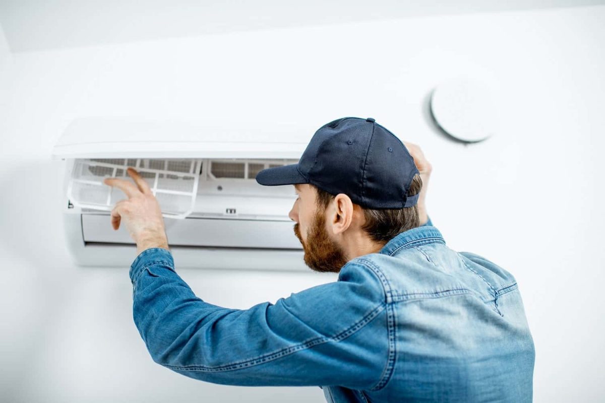 man-serving-the-air-conditioner-2021-09-02-06-24-34-utc-min-min.jpg
