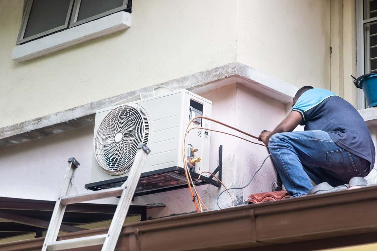 technician-installing-outdoor-air-conditioner-comp-2022-02-05-12-50-04-utc-min-min.jpg
